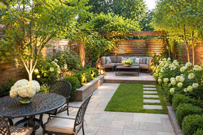 Evening garden with dining patio and lounge seating